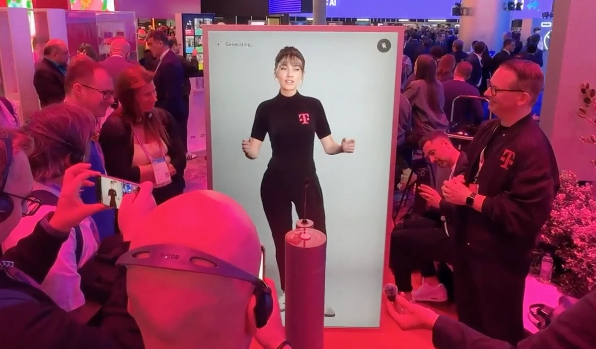Publikum auf dem Mobile World Congress filmt MIA auf dem Bildschirm