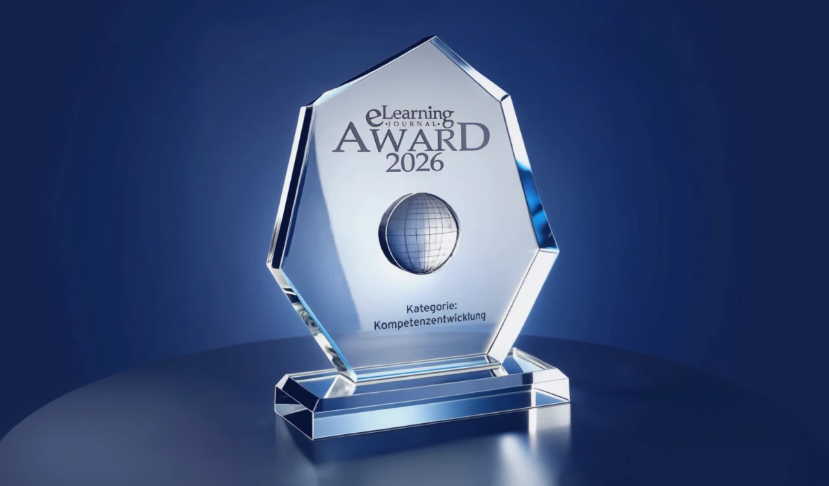 Gläserne Trophäe des eLearning Journal Award 2026 in der Kategorie Kompetenzentwicklung